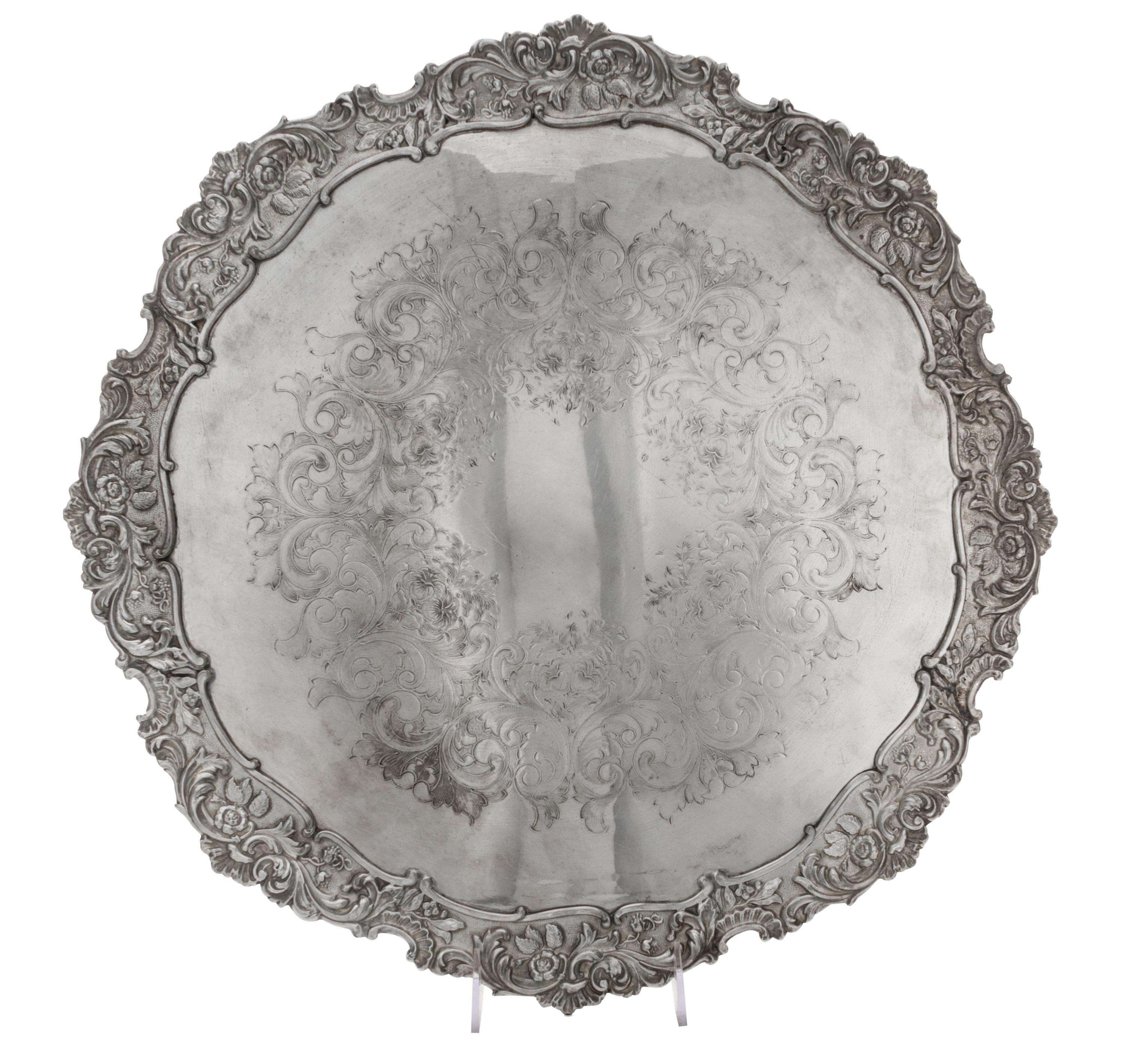 Two English Silver-Plate Trays, 20th Century, comprising an oval handled tray and a circular tray, each after the 18th century original