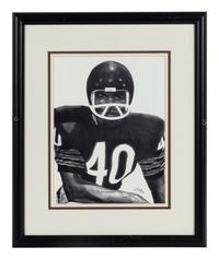 A Group of Nine Artworks of Various Football Players Formerly Displayed at Mike Ditka’s Restaurant