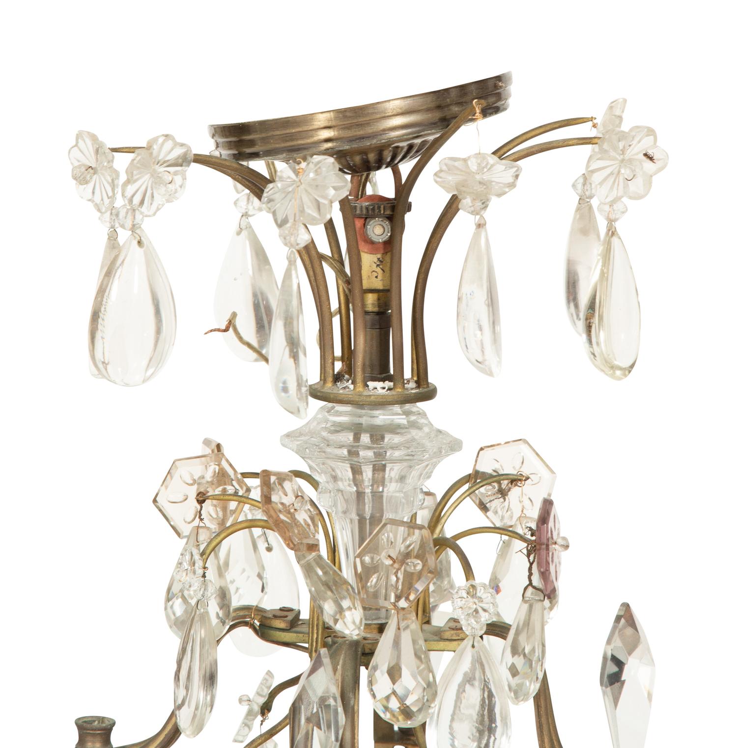 A Louis XV Style Gilt Bronze and Cut Glass Eight-Light Chandelier