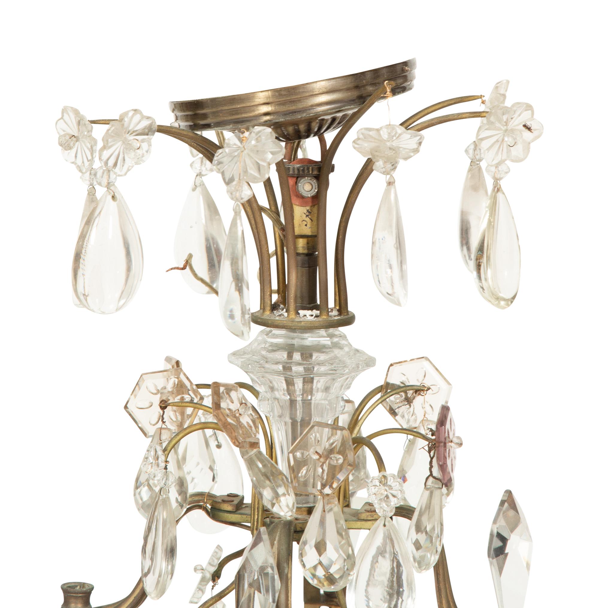 A Louis XV Style Gilt Bronze and Cut Glass Eight-Light Chandelier
