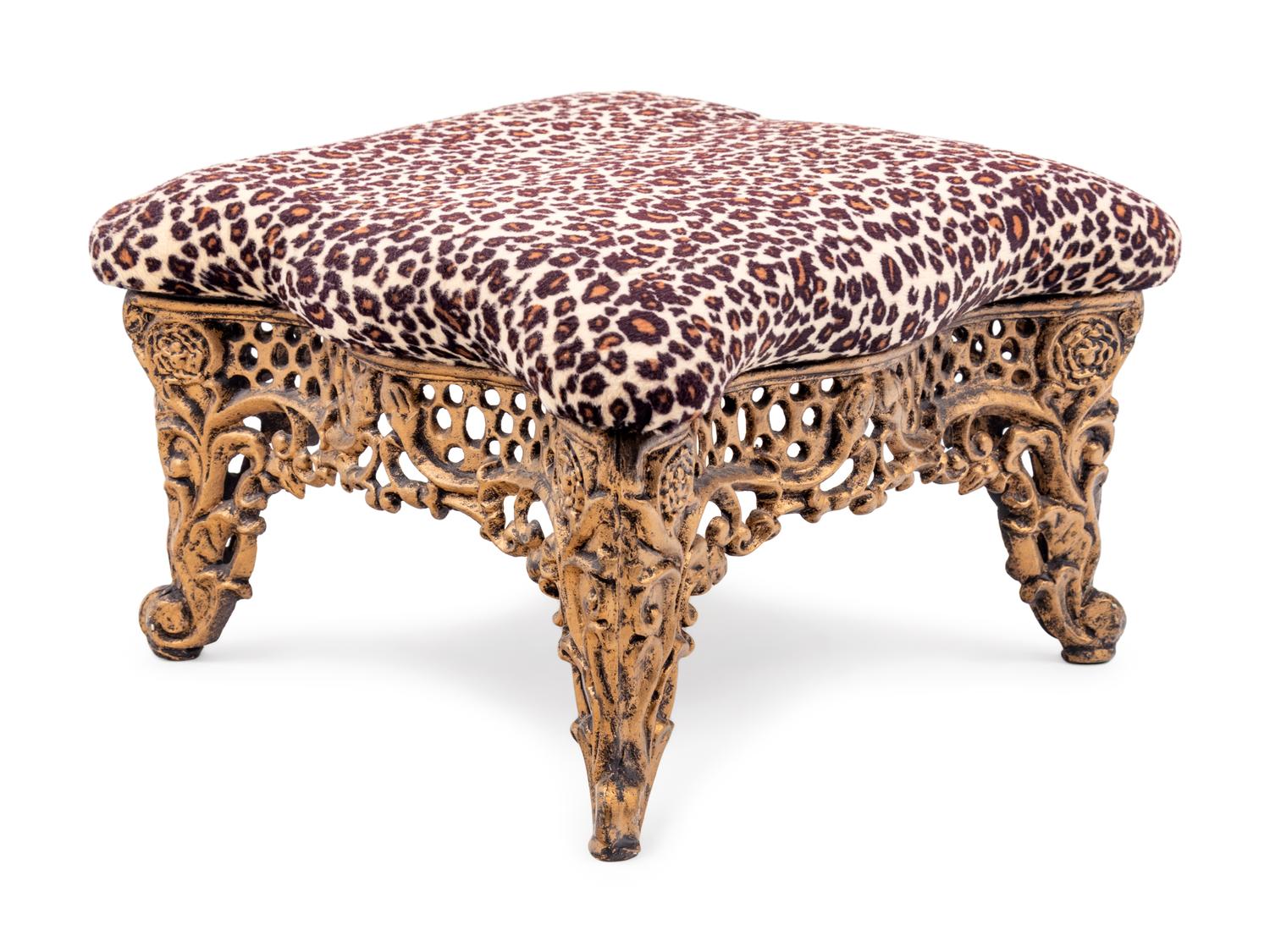 A Brass Foot Stool with Cheetah Print Upholstery
