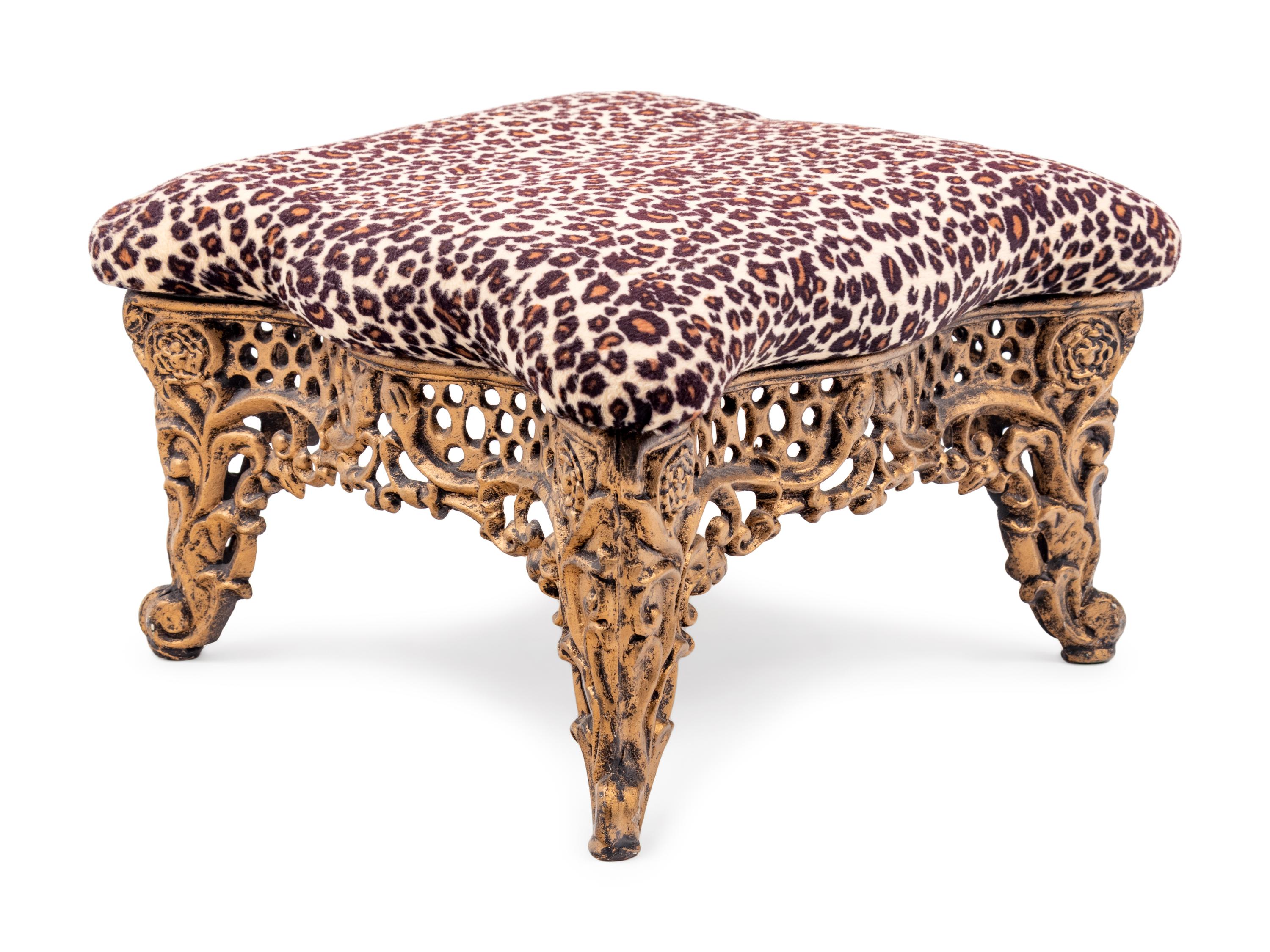 A Brass Foot Stool with Cheetah Print Upholstery