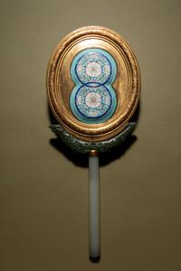 A Painted Enamel and Hardstone Mounted Gilt Metal Hand Mirror