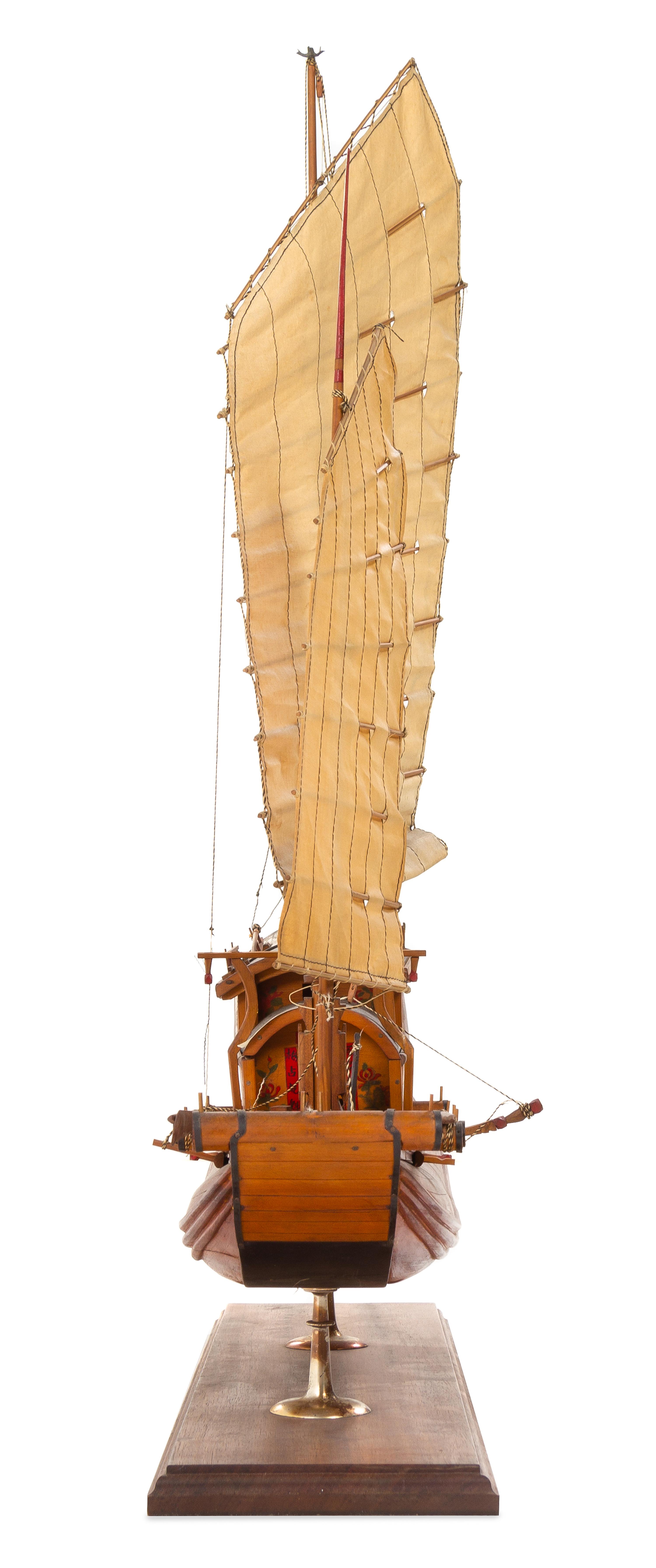 A Model of a Chinese River Junk Height 29 x length of base 28 inches.