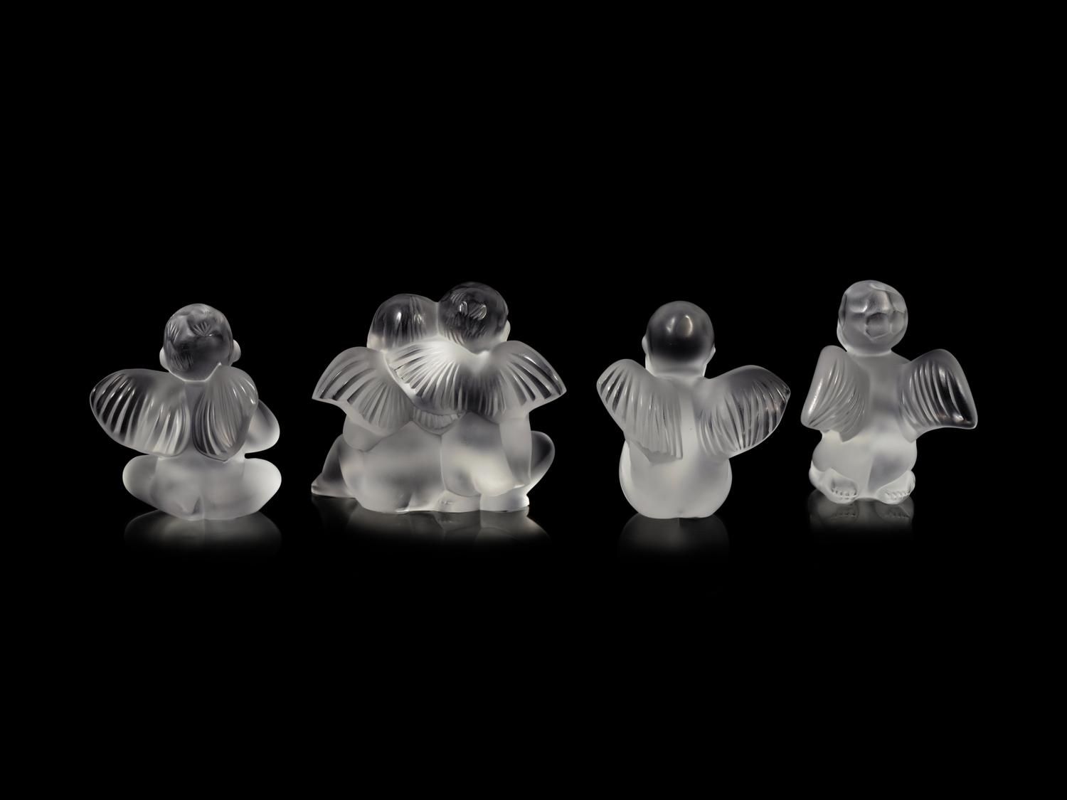 Four Lalique Cherub Figures
