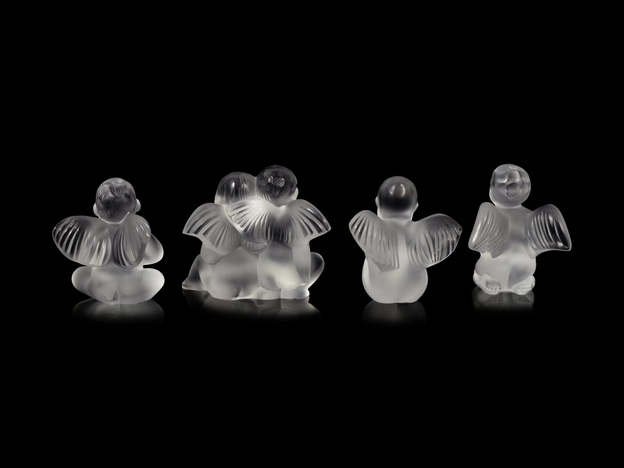 Four Lalique Cherub Figures