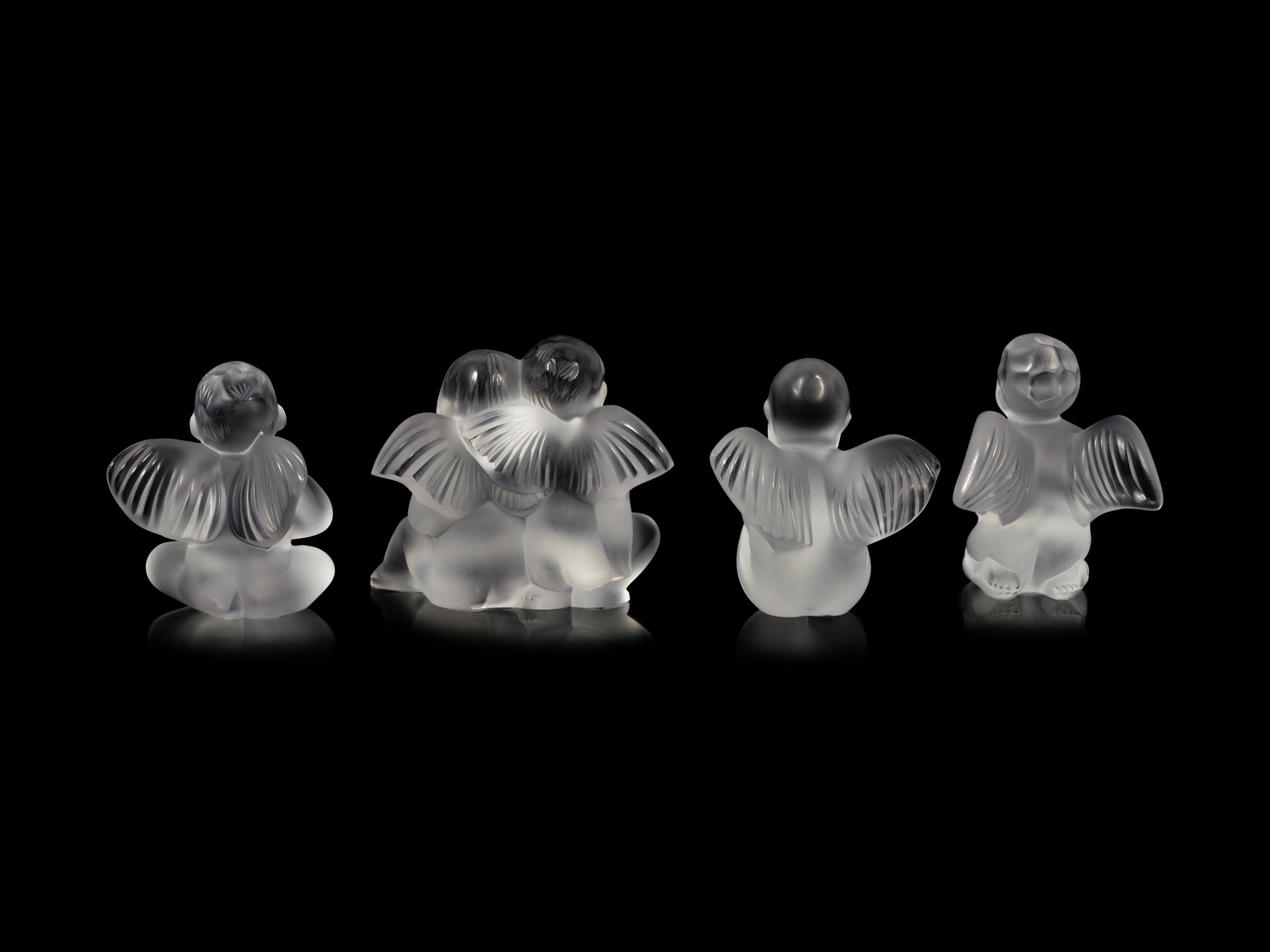 Four Lalique Cherub Figures