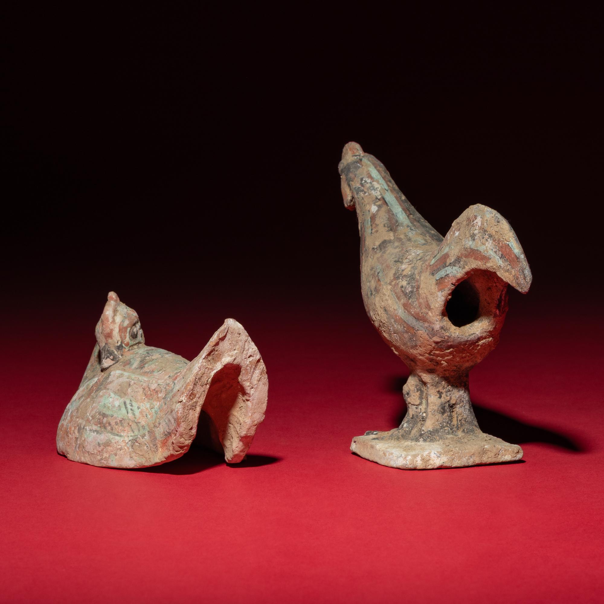 A Chinese Painted Pottery Mandarin Duck and a Cockerel, Han Dynasty — 漢 灰陶彩繪鴛鴦與小公雞