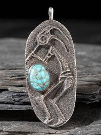 Tufa Cast Silver Kokopelli Pendant, with Turquoise