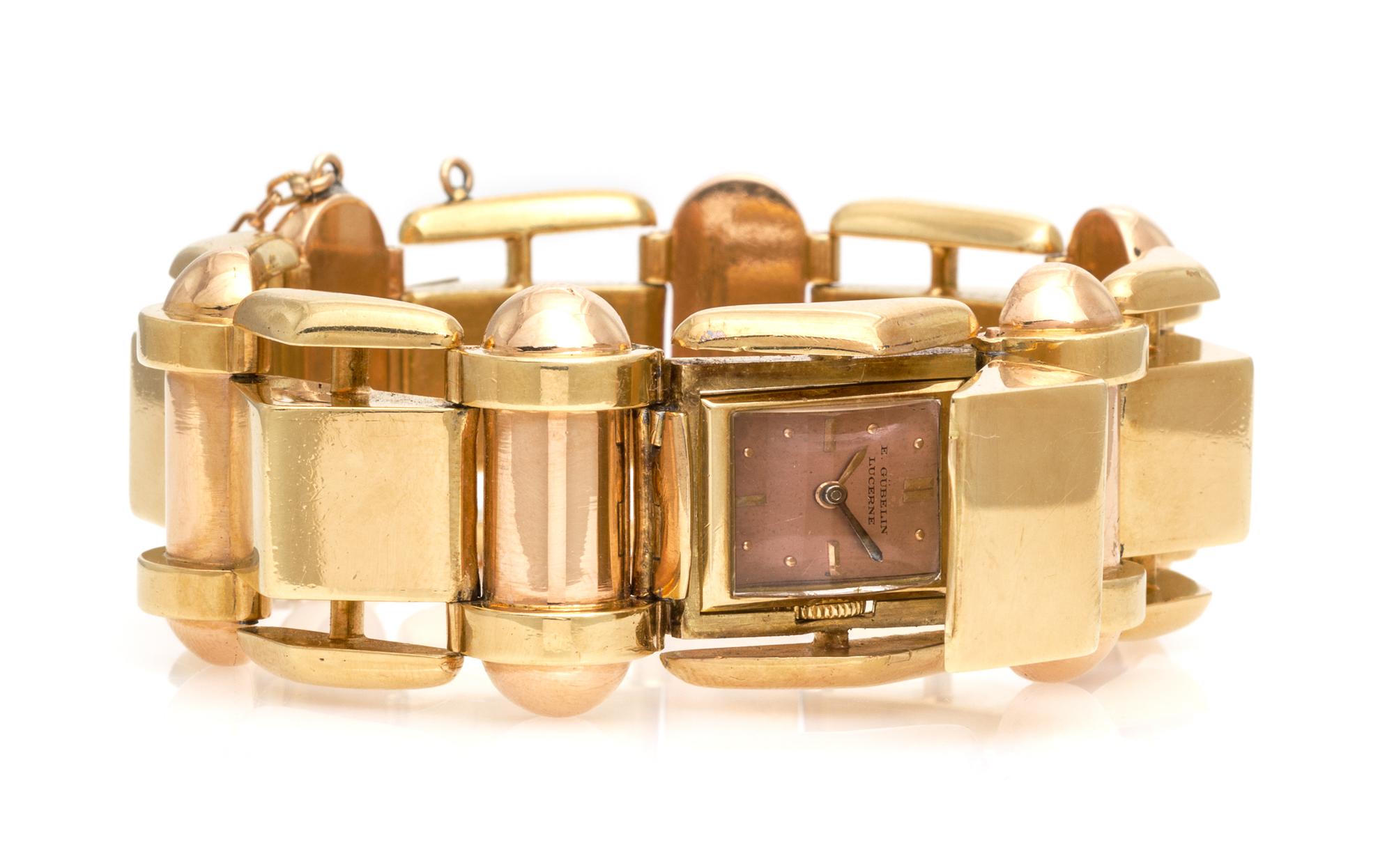 A Retro 18 Karat Two Tone Gold Surprise Wristwatch, Gübelin, 103.60 dwts.