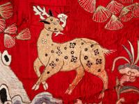 Two Chinese Red Ground Embroidered Silk 'Longevity' Panels