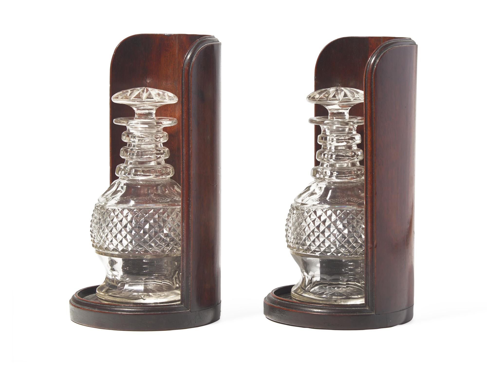 A Pair of George III Mahogany Decanter Stands With Cut Glass Decanters