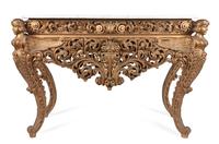 A Continental Figural Console Table Height 35 x width 52 x depth 23 inches.