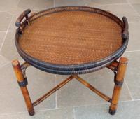 A Folding Table with Circular Tray Top Height 19 3/4 x diameter 28 1/2 inches.