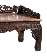 A Chinese Carved Hardwood Four-Piece Furniture Suite