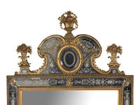 A Pair of Swedish Baroque Style Gilt Metal Mounted Etched Glass Mirrors