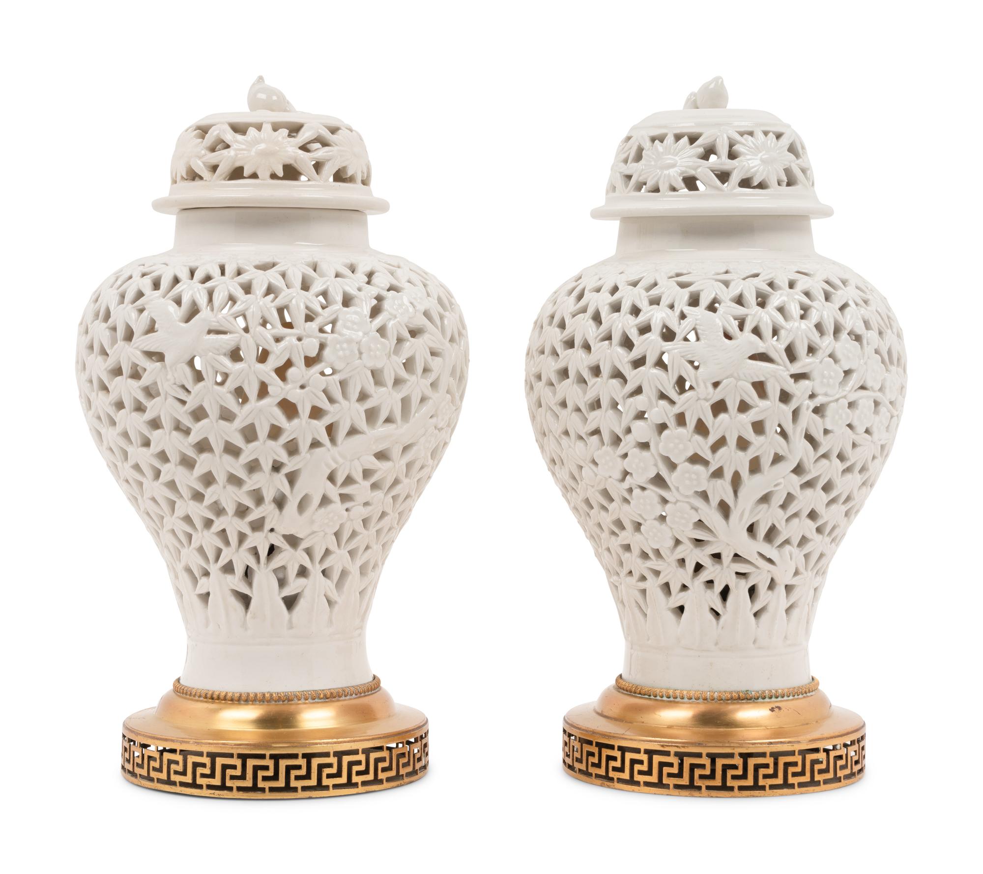 A Pair of White-Glazed Pierced Porcelain Jars Mounted as Lamps