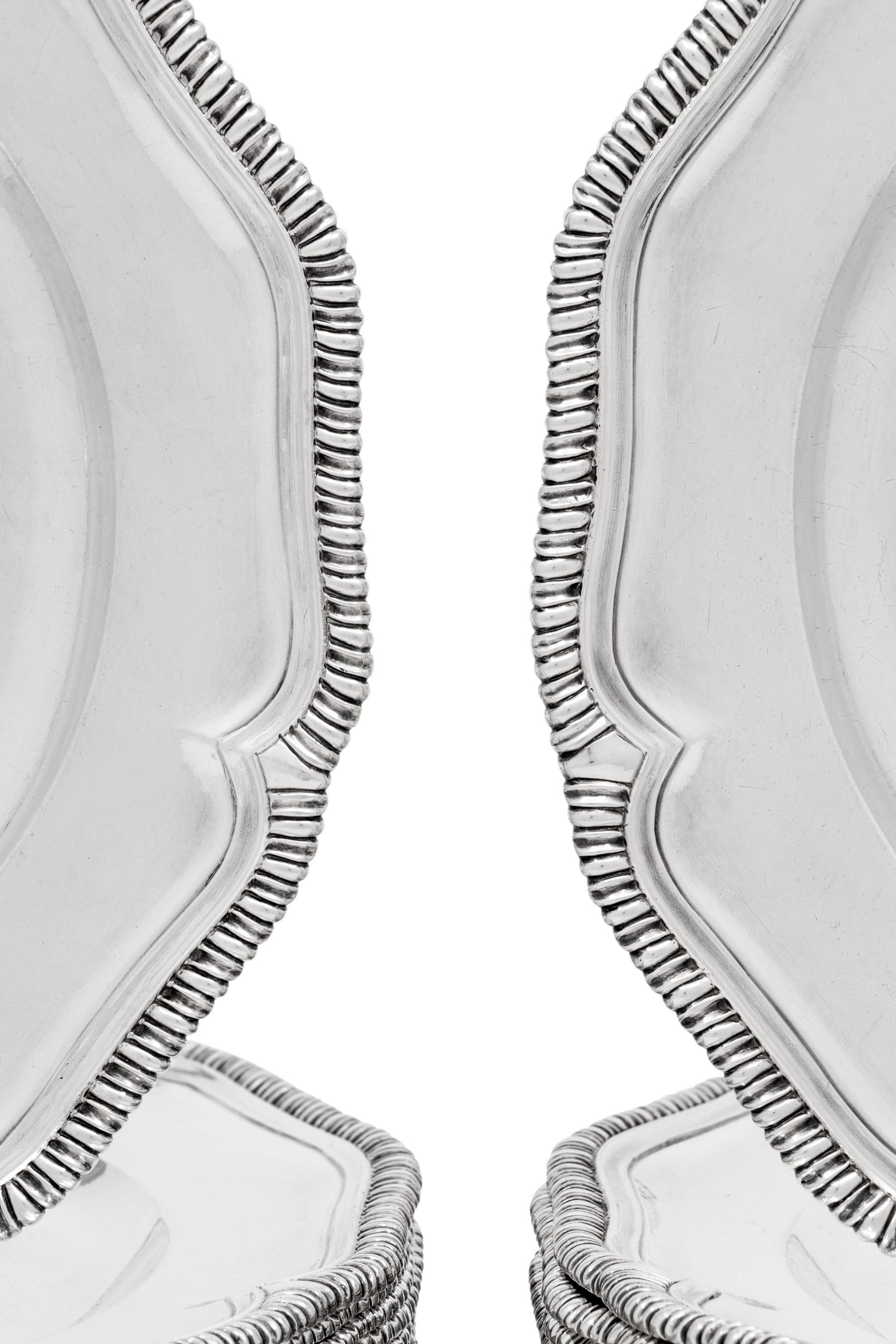Two Sets of Twelve George III Silver Dinner Plates