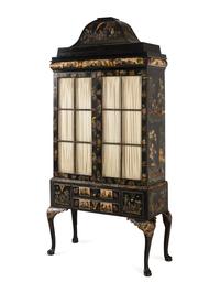 A Queen Anne Style Polychrome and Black Japanned Bookcase on Stand