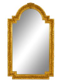 A Carver's Guild Carved Giltwood Mirror