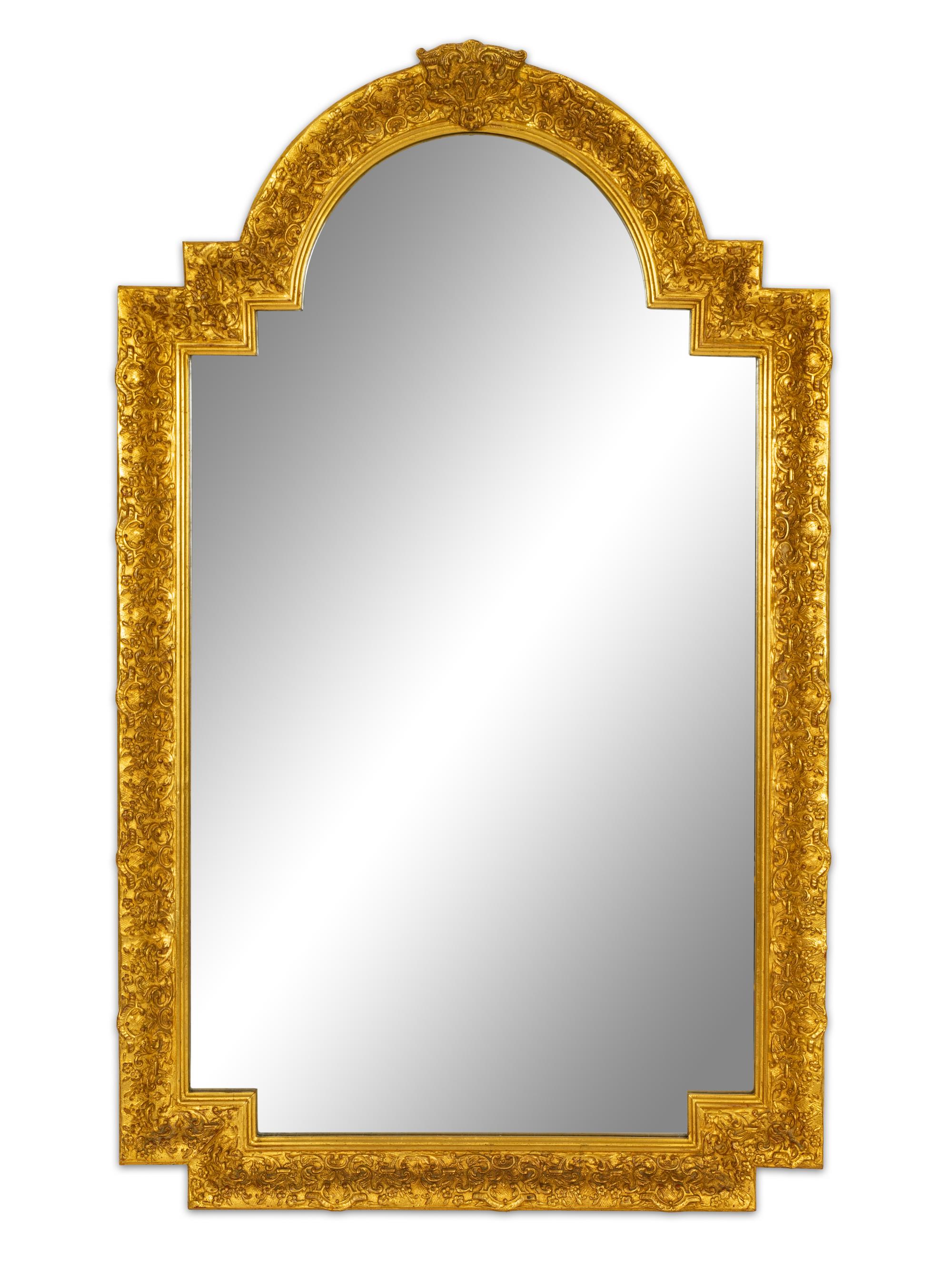 A Carver's Guild Carved Giltwood Mirror