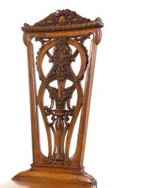 A Pair of Continental Renaissance Revival Carved Oak Side Chairs