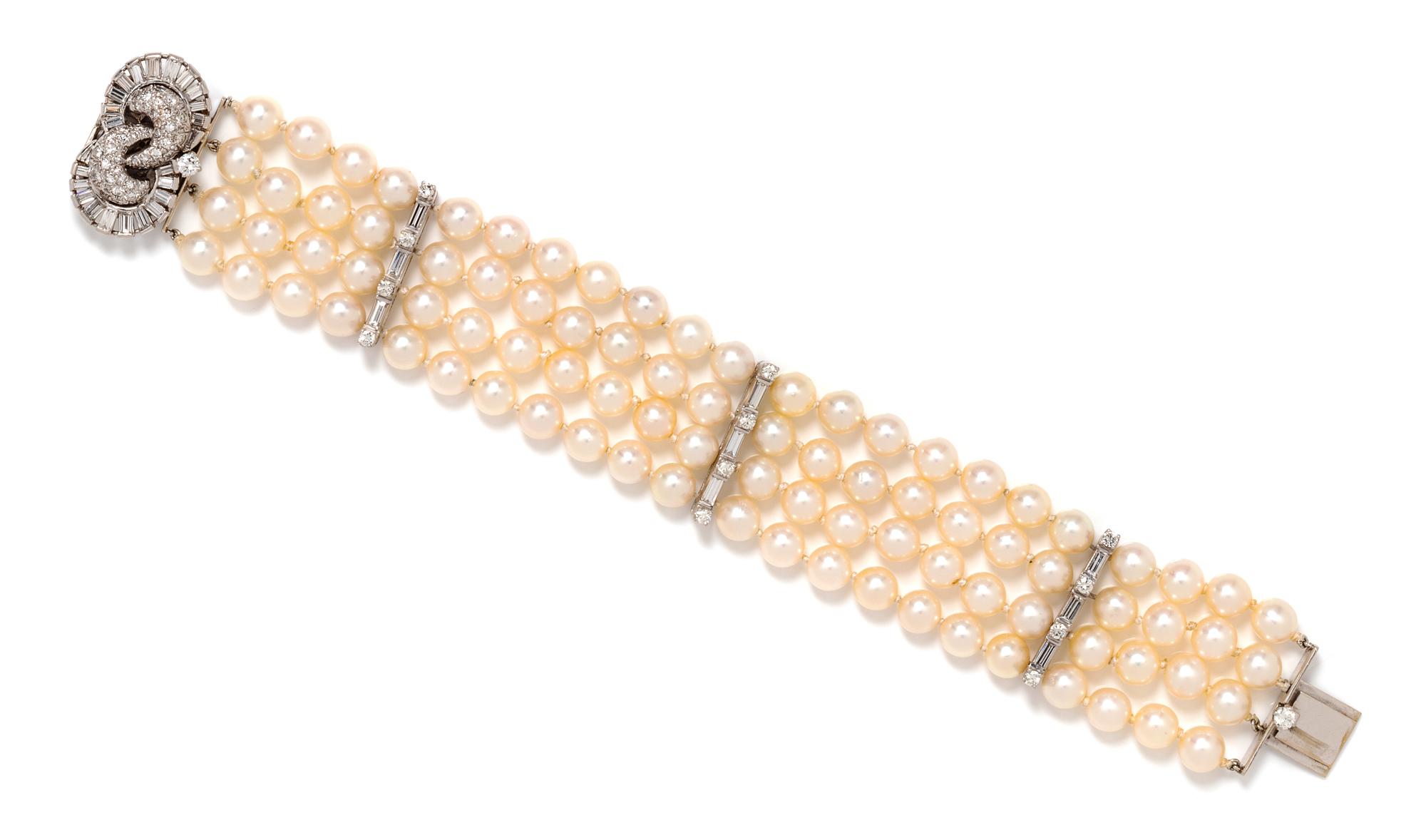 A Platinum, White Gold, Diamond and Cultured Pearl Bracelet, 39.30 dwts.