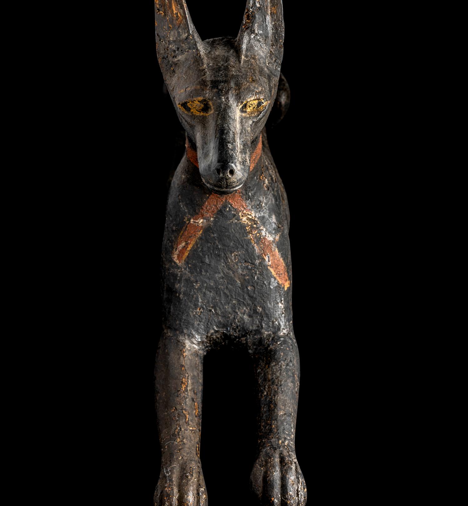 An Egyptian Painted Wood Anubis