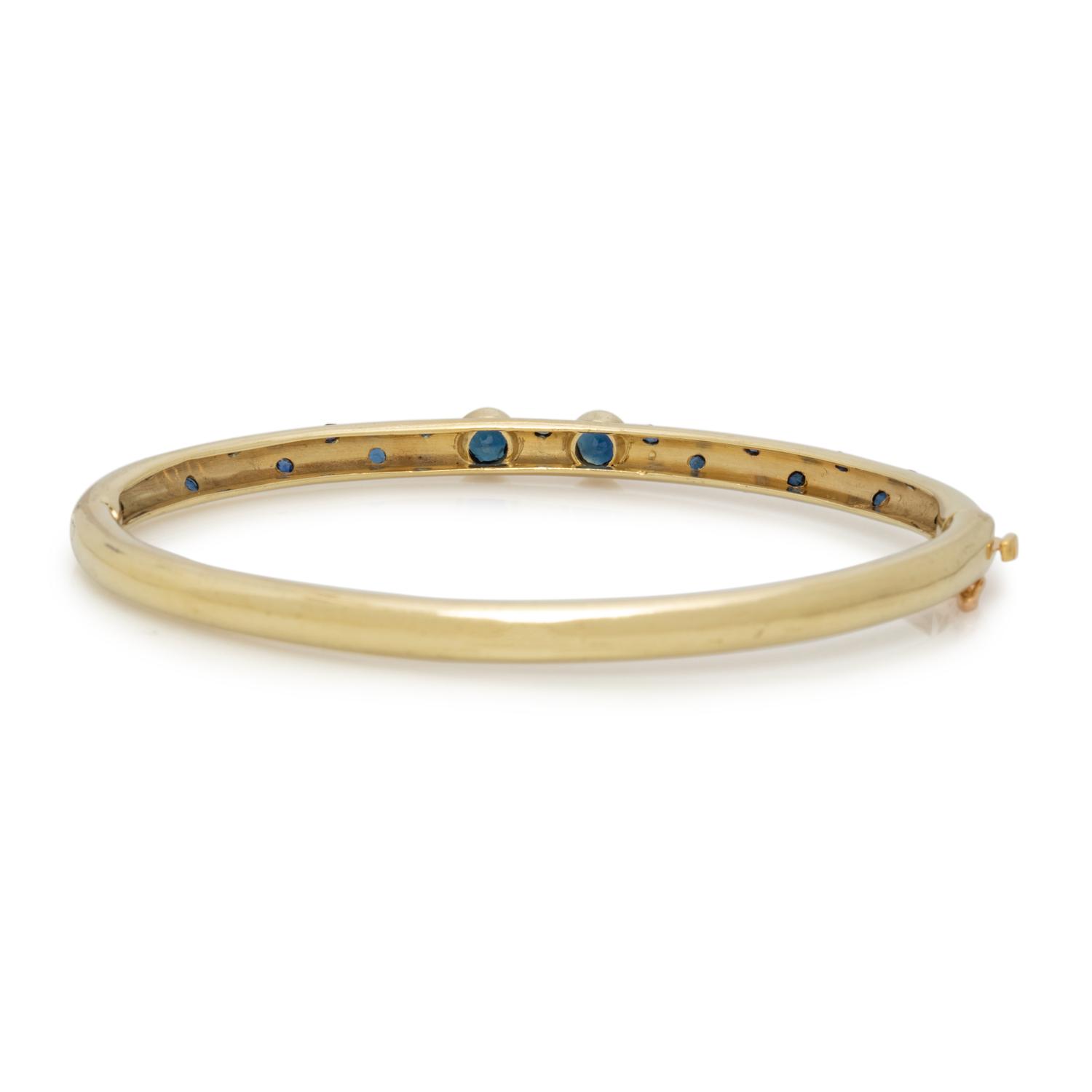 YELLOW GOLD AND SAPPHIRE BANGLE BRACELET