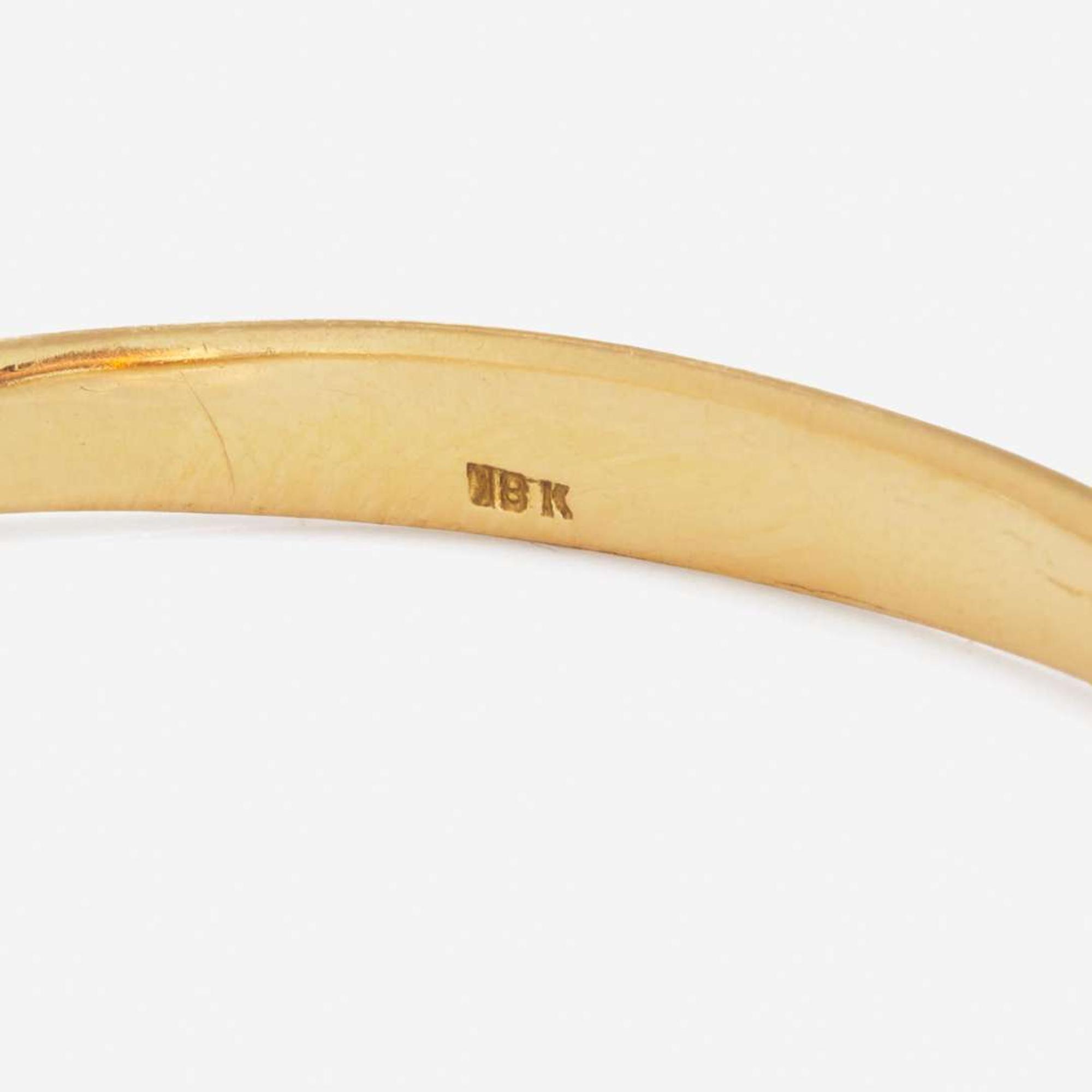 An 18K Yellow Gold Bangle Bracelet