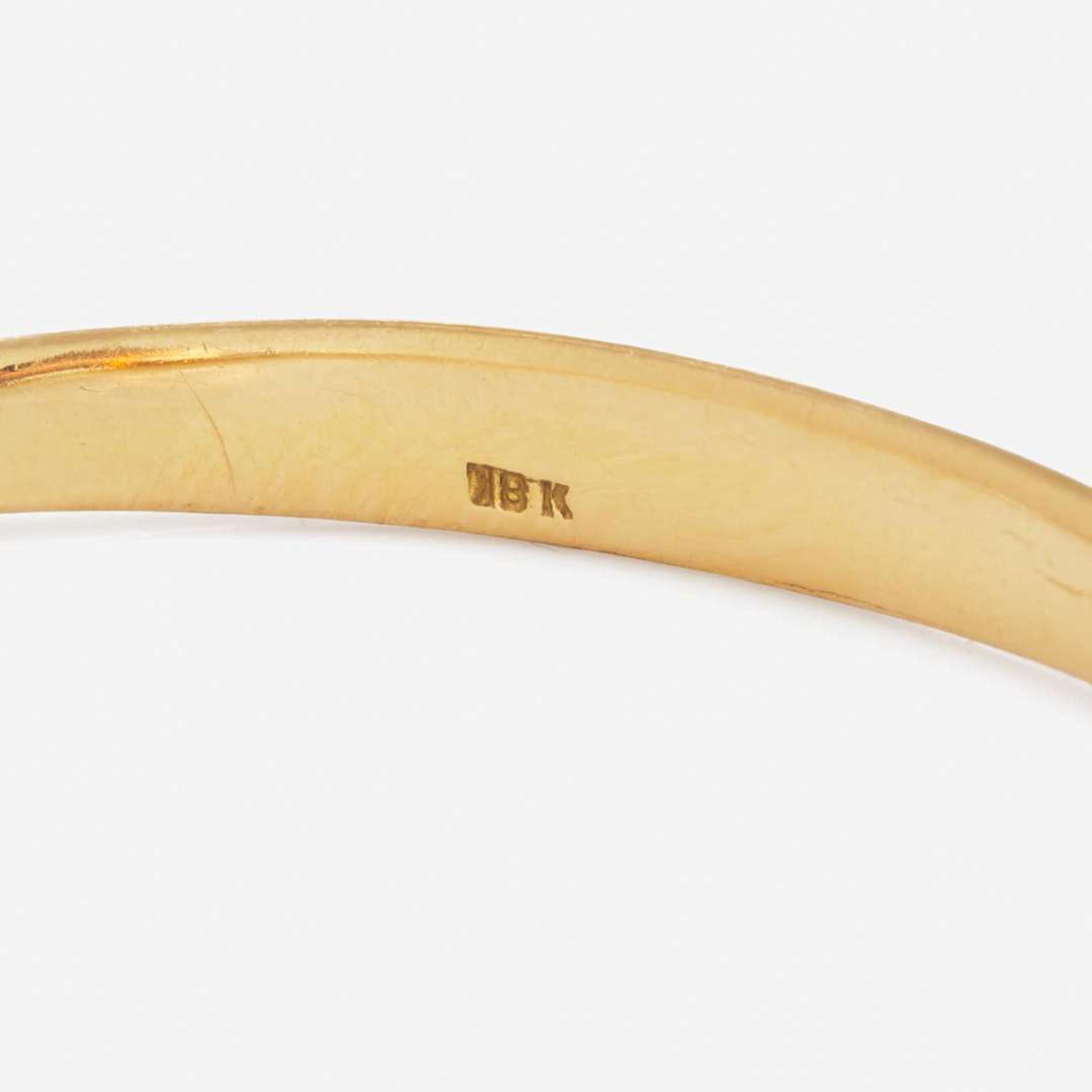 An 18K Yellow Gold Bangle Bracelet