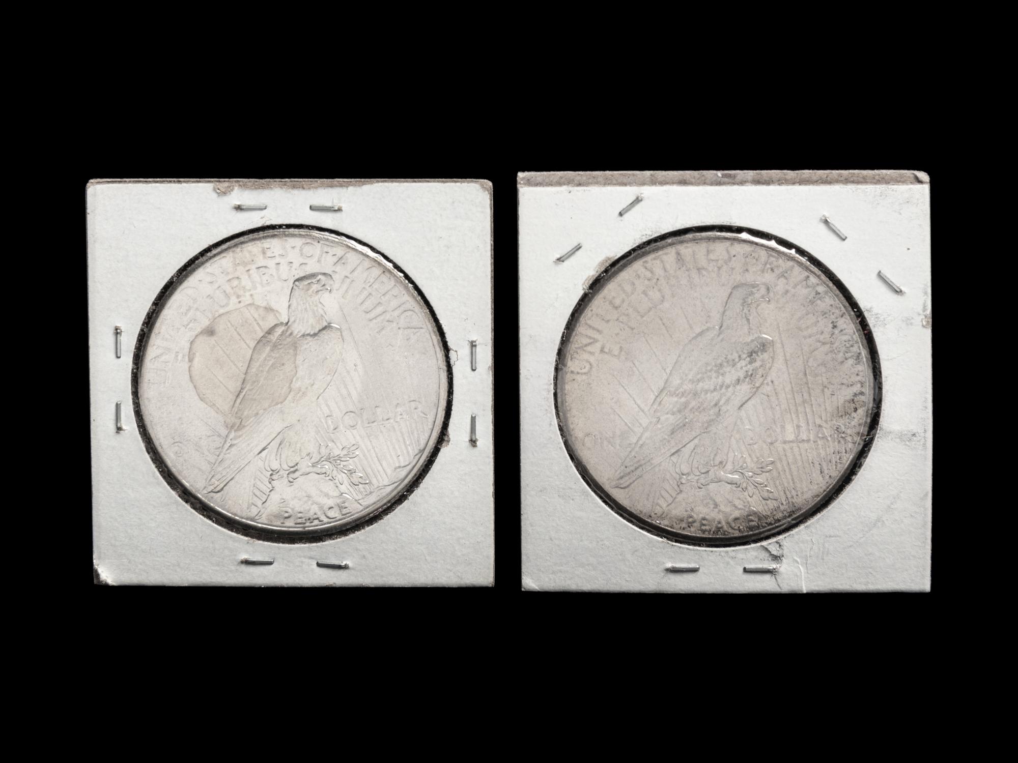 Two 1927 Peace $1 Coins