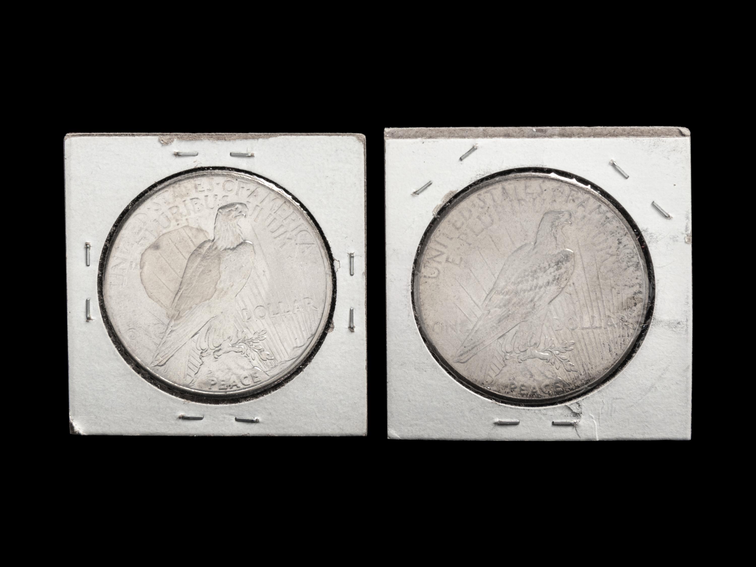 Two 1927 Peace $1 Coins