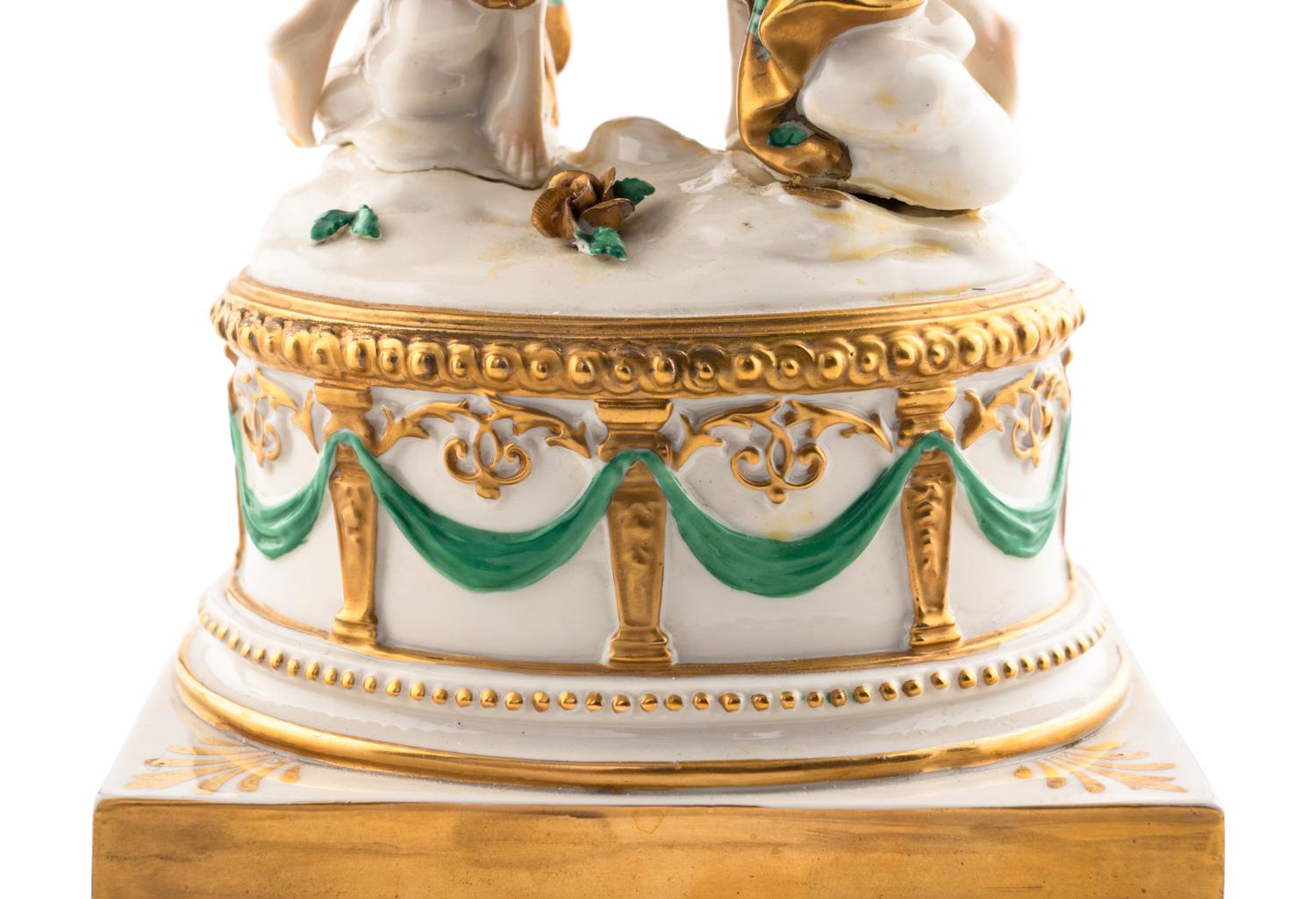 A Pair of Capodimonte Porcelain Figural Two-Light Candelabra