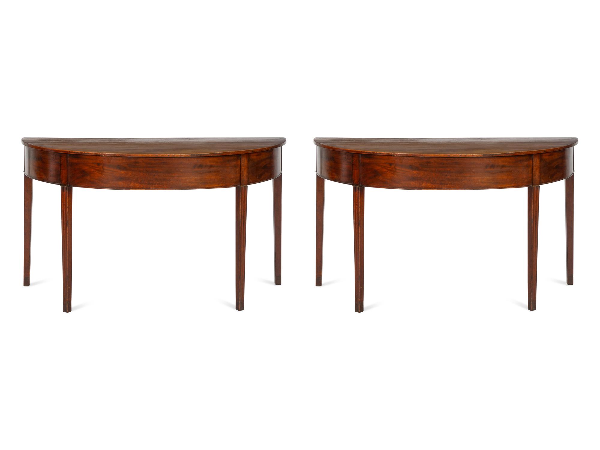 A Pair of George III Mahogany Demilune Console Tables