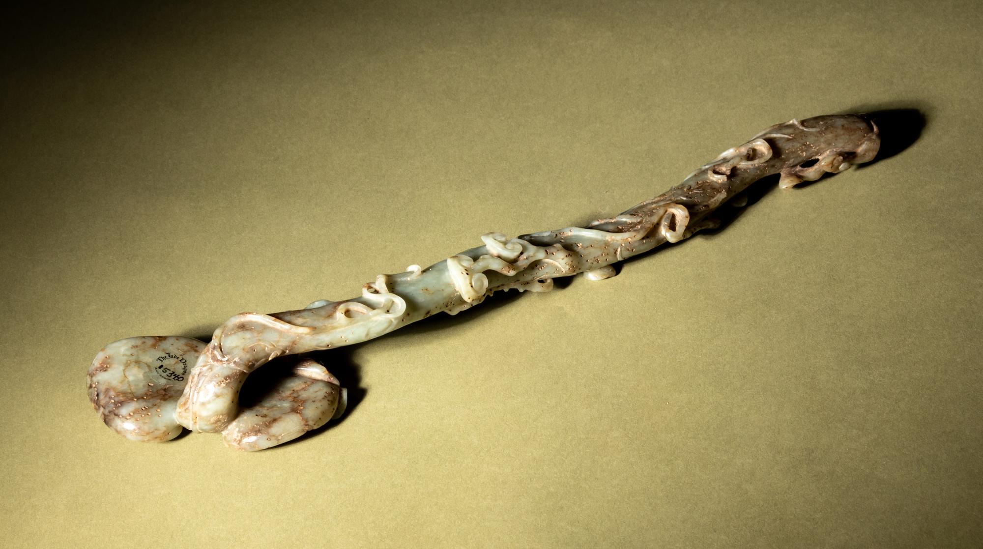 A Celadon and Grey Jade Ruyi Scepter