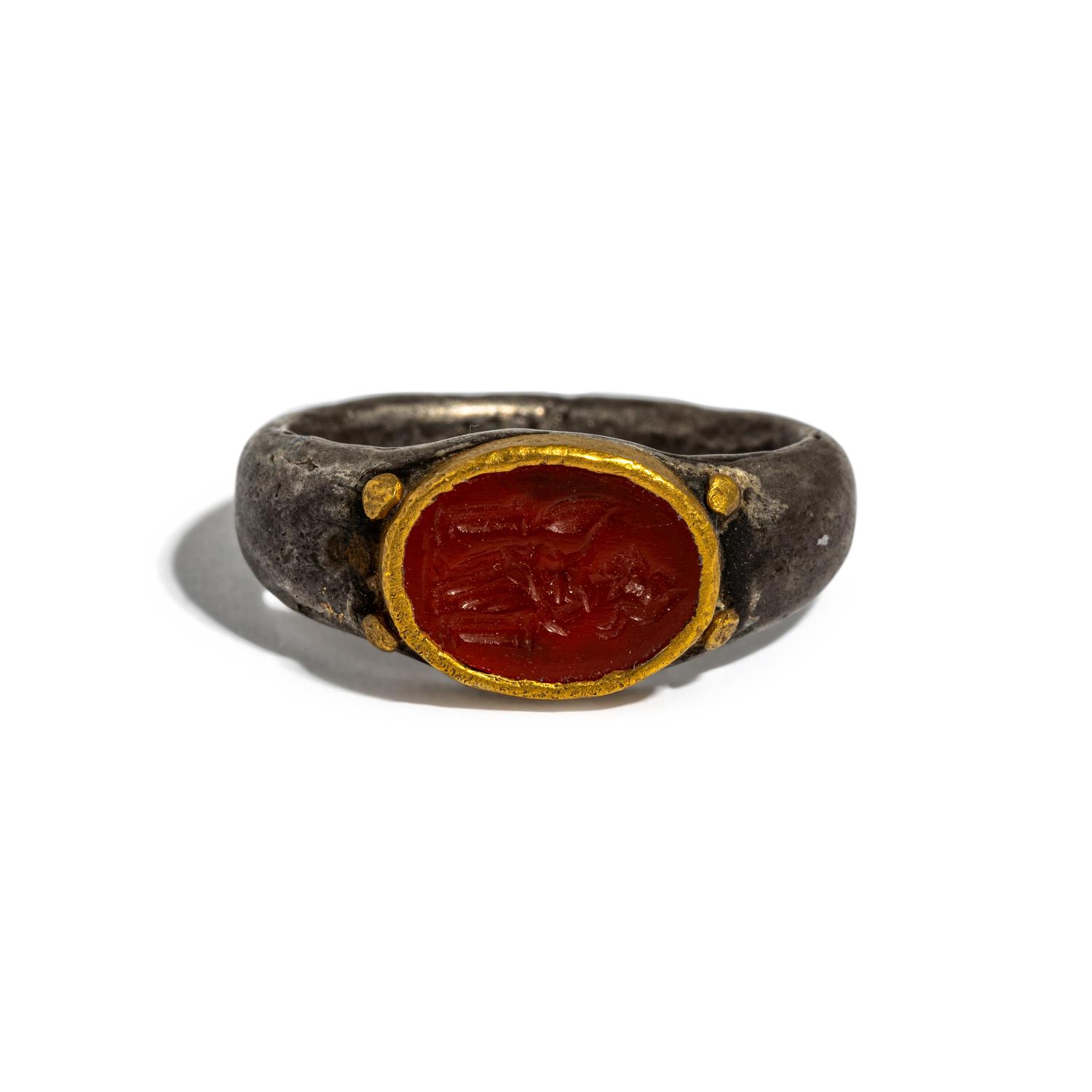 A Roman Gilt-Silver and Carnelian Finger Ring with the Goddess Minerva