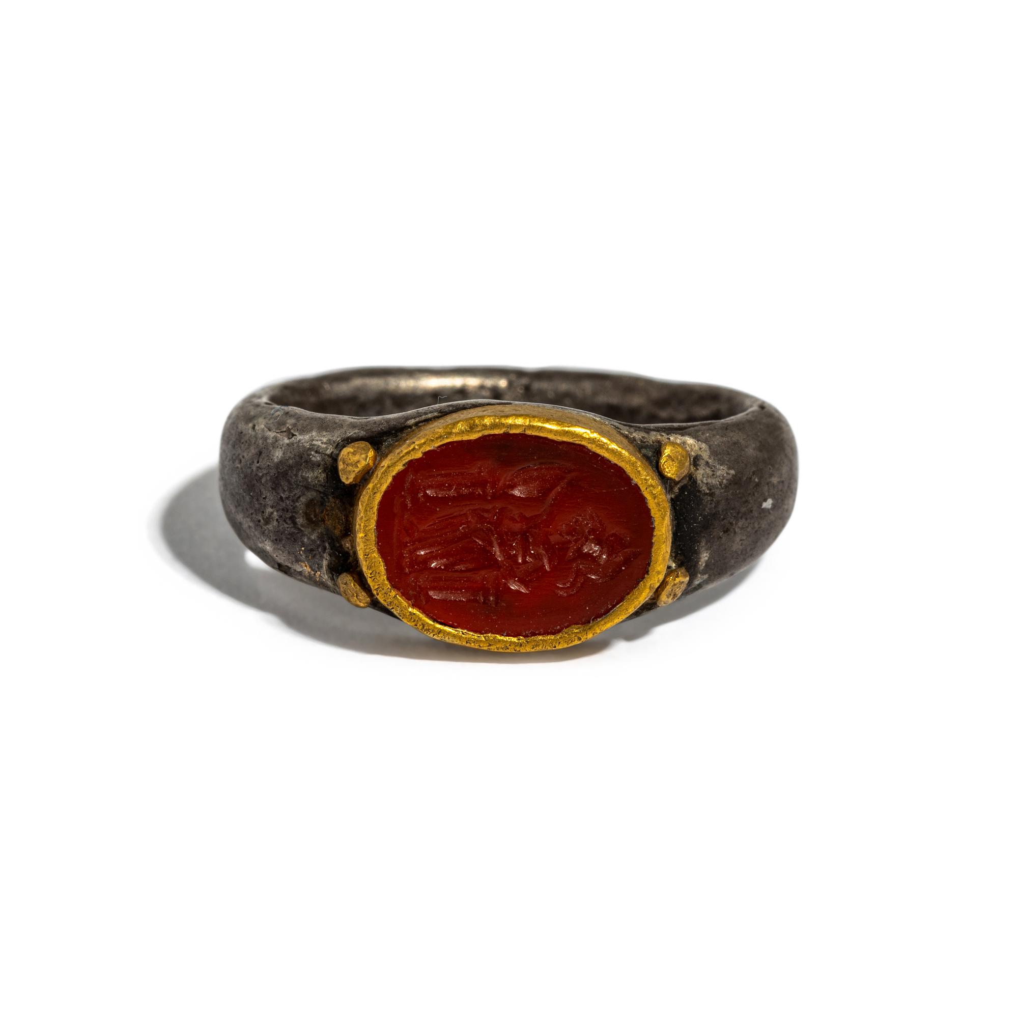 A Roman Gilt-Silver and Carnelian Finger Ring with the Goddess Minerva