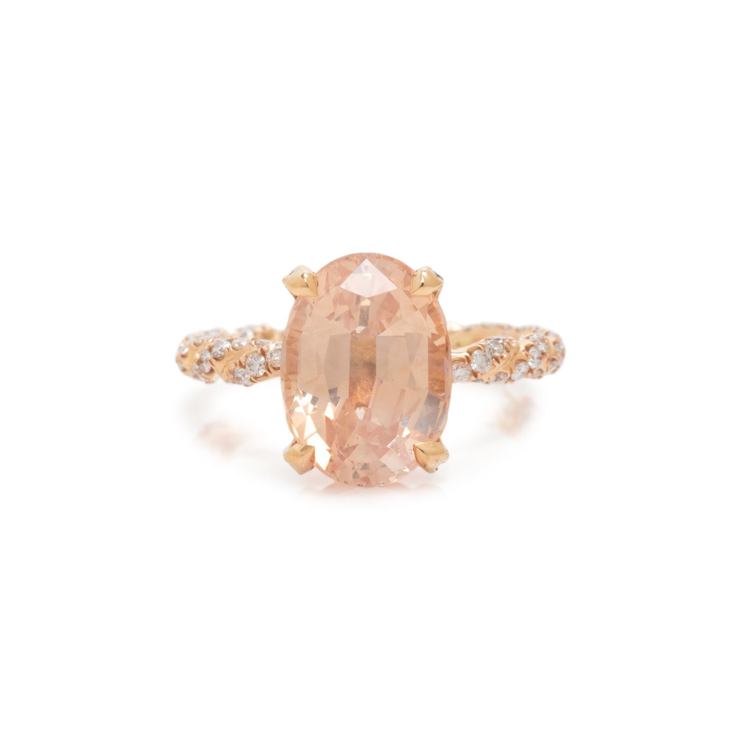 ORANGE SAPPHIRE AND DIAMOND RING