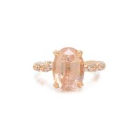 ORANGE SAPPHIRE AND DIAMOND RING
