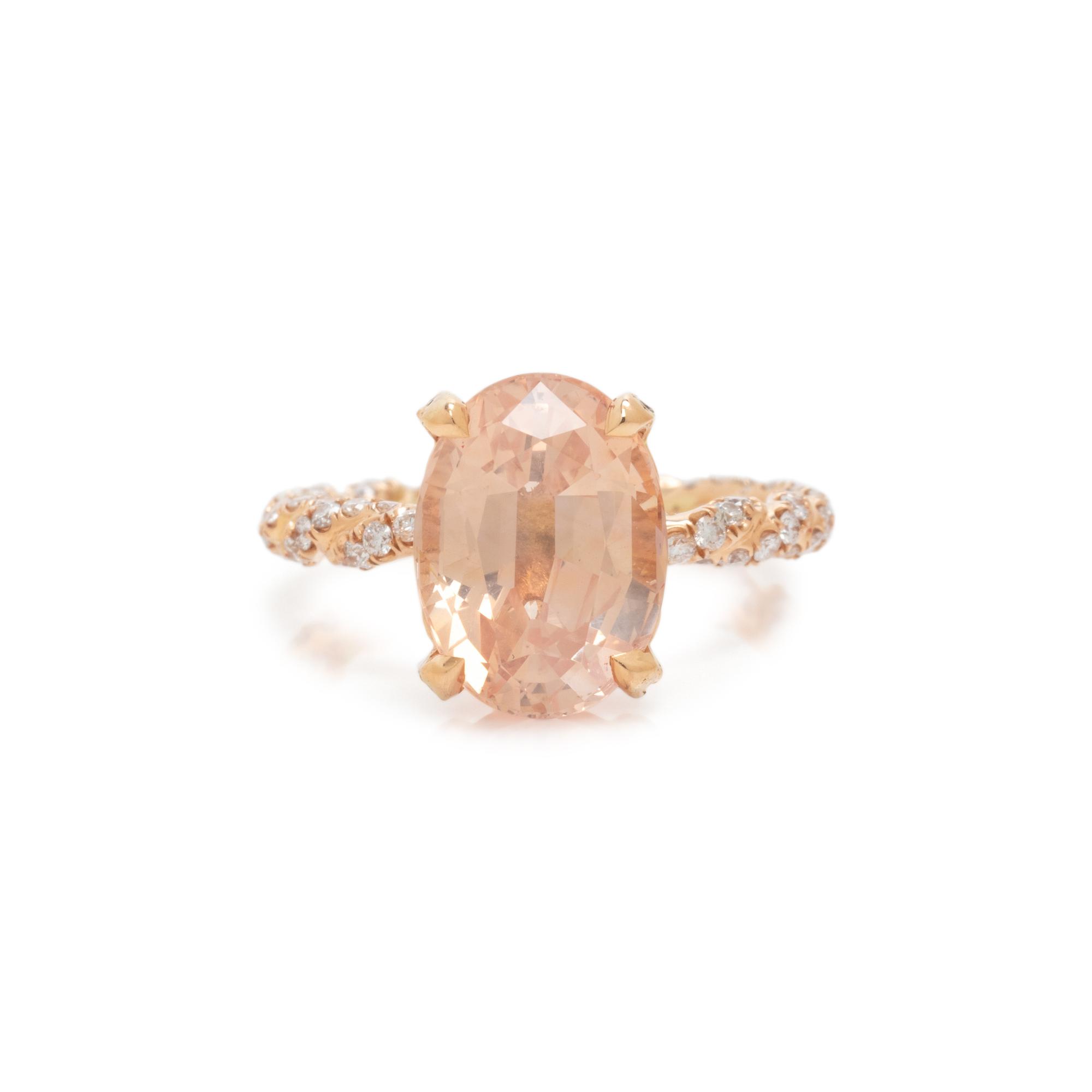 ORANGE SAPPHIRE AND DIAMOND RING