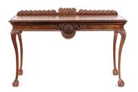An Irish George II Style Walnut Console Table Height 40 x width 61 x depth 26 1/4 inches. — 19TH CENTURY
