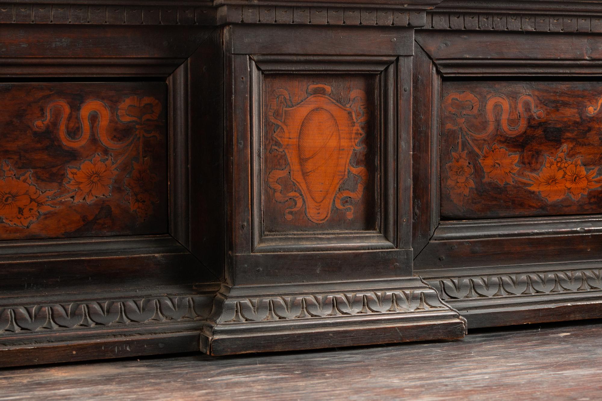 An Italian Baroque Walnut and Marquetry Cabinet