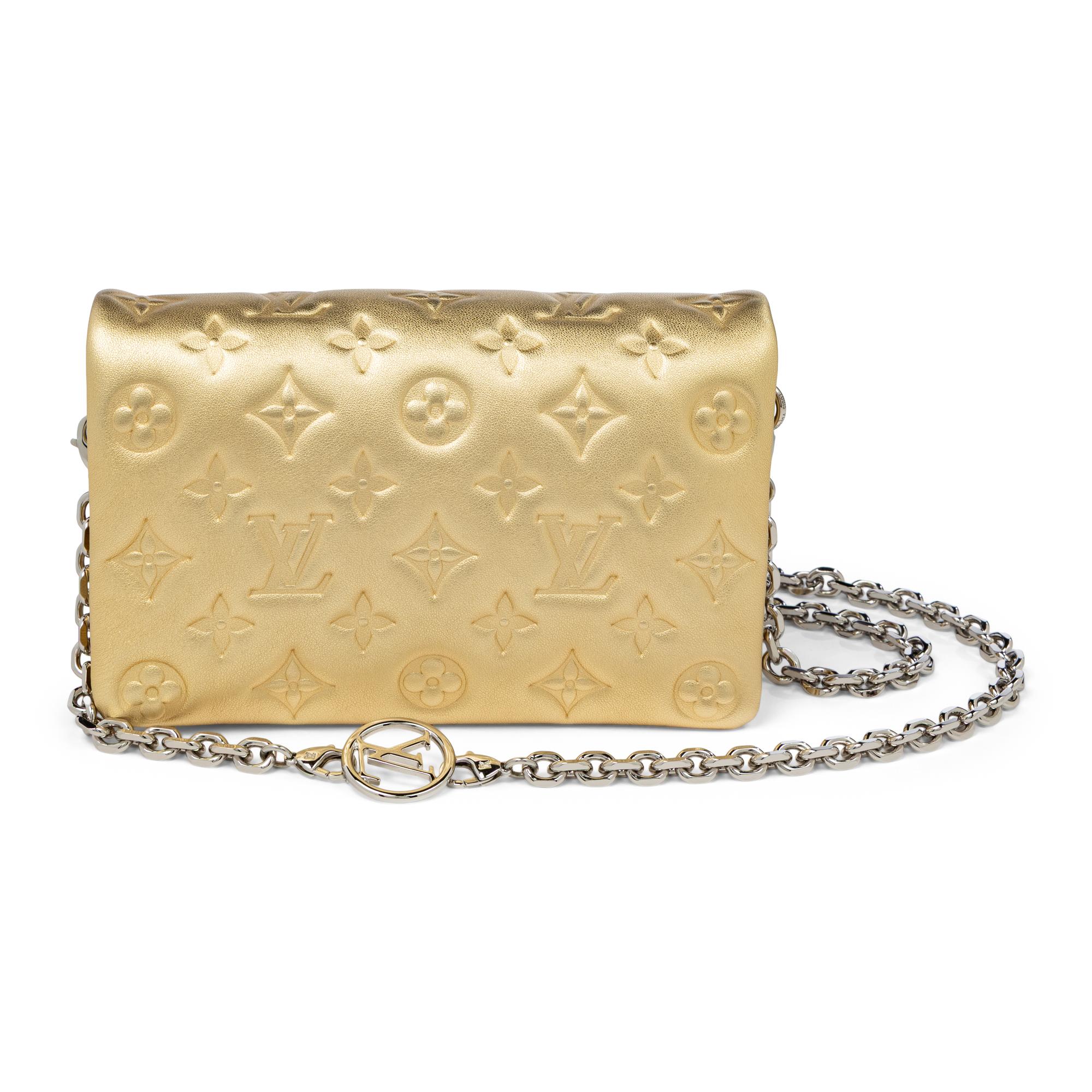 Louis Vuitton, Coussin Bag in Gold Empreinte Leather