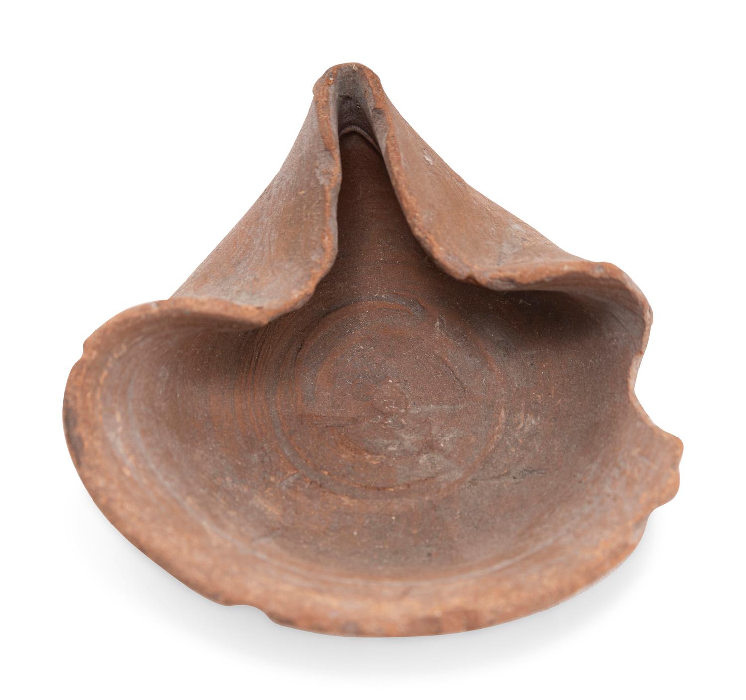 Six 'Shell Type' Terracotta Oil Lamps