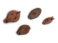 Four Roman Terracotta Oil Lamps