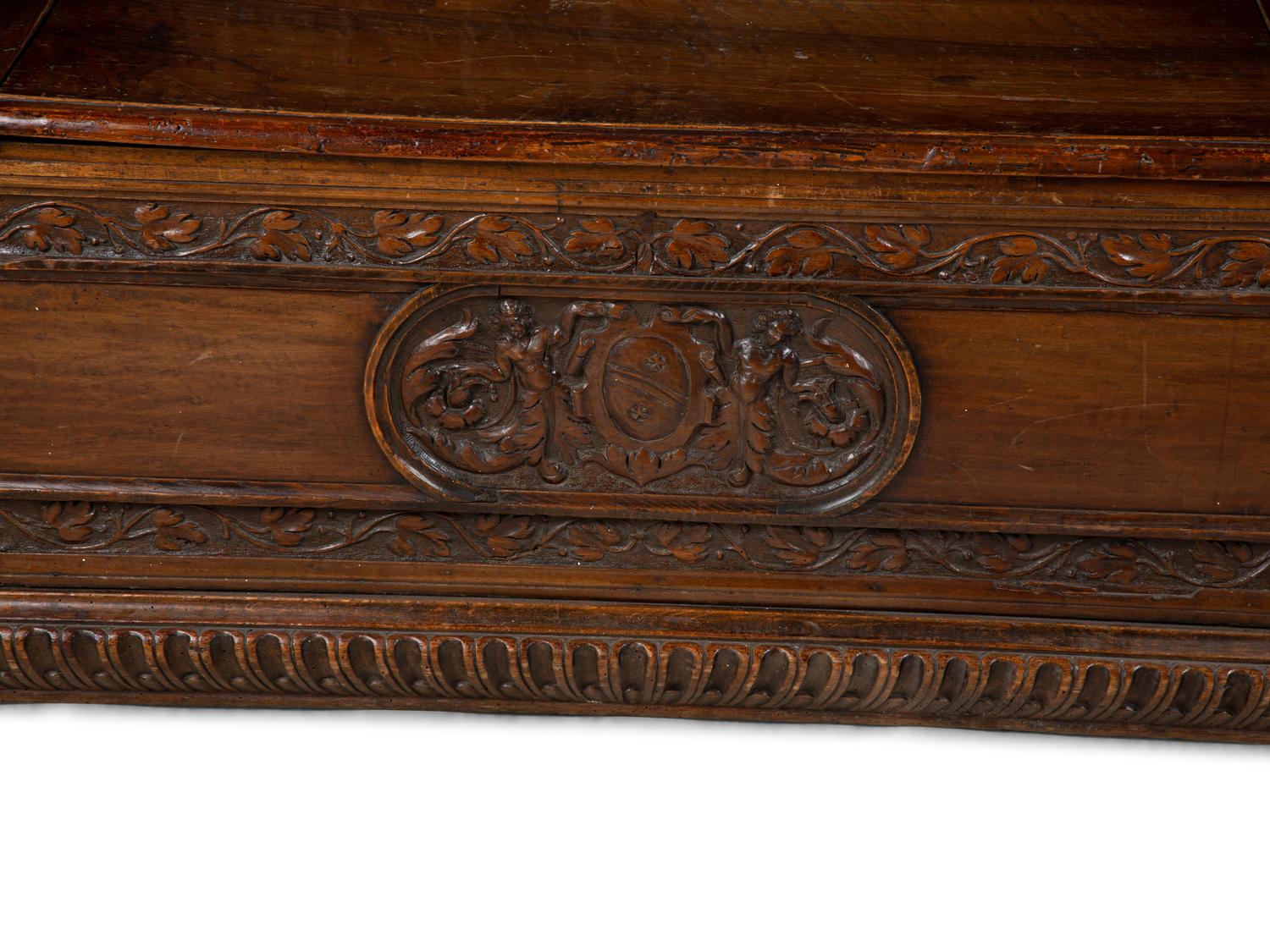 An Italian Carved Walnut Cassapanca — 17/18TH CENTURY AND LATER