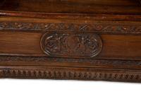 An Italian Carved Walnut Cassapanca — 17/18TH CENTURY AND LATER