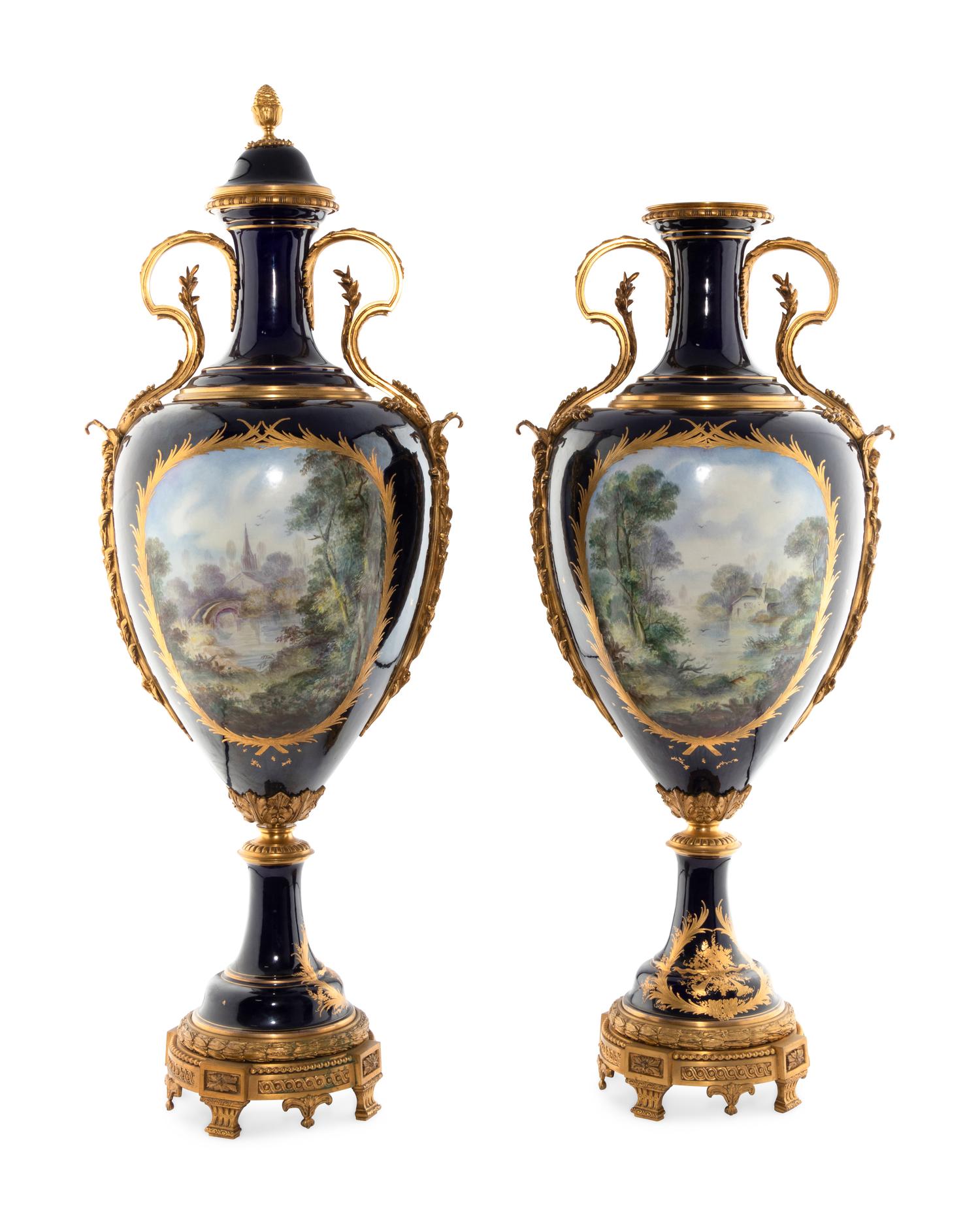 A Pair of Gilt Bronze Mounted Sèvres Style Porcelain Urns