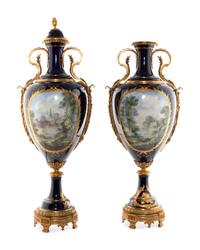 A Pair of Gilt Bronze Mounted Sèvres Style Porcelain Urns